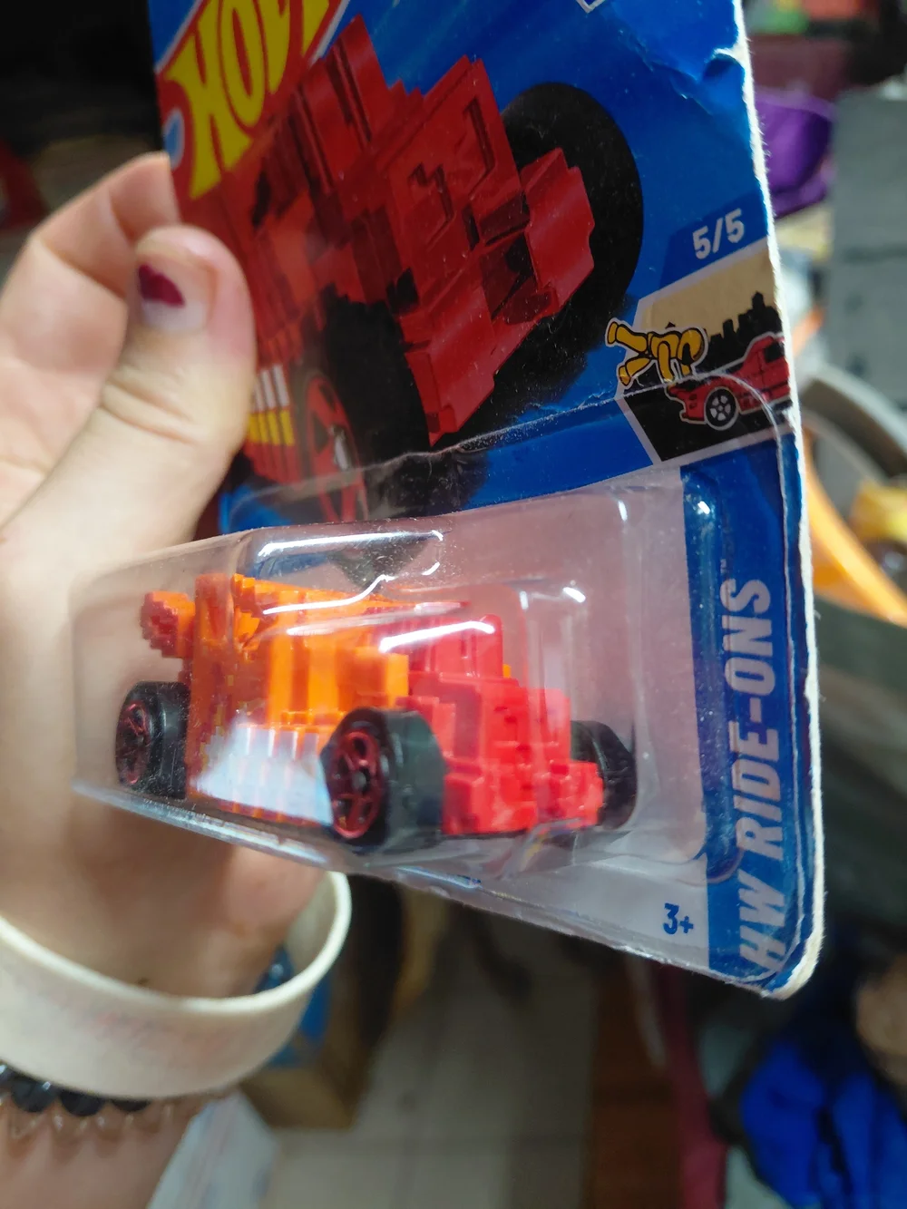 orange Hot Wheels Pixel Shaker diecast car (collector number 138/250, HW Ride-On